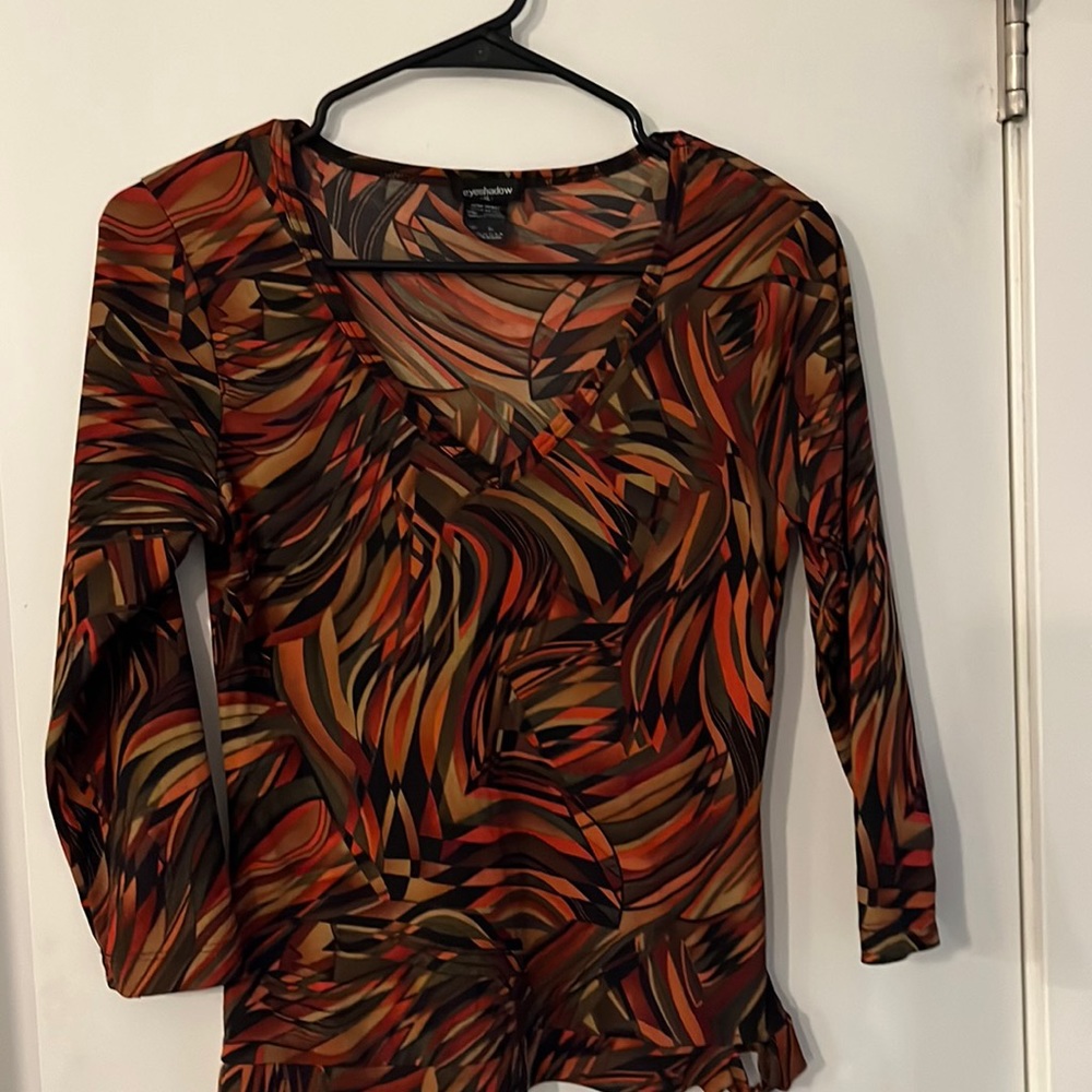 This is vintage! I love it still but it does not fit me anymore.